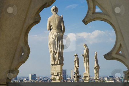 To use this stock image in your creative project, please select the size you need over to the right and click the "Add to Cart" button.
Your downloaded image will come with the Cutcaster watermark removed so don’t worry about the watermark you see on this page. Il Duomo di Milano stock photo, Statues at the roof of Il Duomo di Milano, the fourth-largest church in the world. by Anibal Trejo
