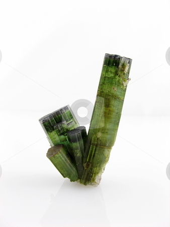To use this stock image in your creative project, please select the size you need over to the right and click the "Add to Cart" button.
Your downloaded image will come with the Cutcaster watermark removed so don’t worry about the watermark you see on this page. Tourmaline Crystals var. Verdilite stock photo, A group of green tourmaline crystals to 12cm from Monais Gerais, Brazil isloated on white. Of interest to the jewellers, collectors and in metaphysical healing where they are used for energising the central nervous system. by Gozzoli