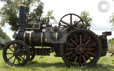 To use this stock image in your creative project, please select the size you need over to the right and click the "Add to Cart" button.
Your downloaded image will come with the Cutcaster watermark removed so don’t worry about the watermark you see on this page. Traction Steam Engine stock photo, A lovely vintage traction steam engine by Stephen Clarke