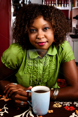 To use this stock image in your creative project, please select the size you need over to the right and click the "Add to Cart" button.
Your downloaded image will come with the Cutcaster watermark removed so don’t worry about the watermark you see on this page. Pretty African American Woman stock photo, Pretty African American Woman in Bright Green Blouse by Scott Griessel