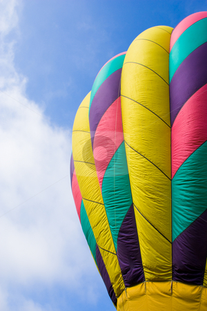 To use this stock image in your creative project, please select the size you need over to the right and click the "Add to Cart" button.
Your downloaded image will come with the Cutcaster watermark removed so don’t worry about the watermark you see on this page. Hot Air Balloon stock photo, Low angle of a hot air balloon. by Nicole Reicher