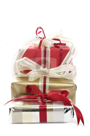 To use this stock image in your creative project, please select the size you need over to the right and click the "Add to Cart" button.
Your downloaded image will come with the Cutcaster watermark removed so don’t worry about the watermark you see on this page. Three christmas packages stock photo, Three christmas packages in front of a white background by Carmen Steiner