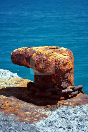 To use this stock image in your creative project, please select the size you need over to the right and click the "Add to Cart" button.
Your downloaded image will come with the Cutcaster watermark removed so don’t worry about the watermark you see on this page. Rusty cleat stock photo, Travel photography: Old rusty cleat in the Mediterranean port of Heraklion, Crete, Greece by Fernando Barozza
