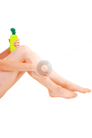 To use this stock image in your creative project, please select the size you need over to the right and click the "Add to Cart" button.
Your downloaded image will come with the Cutcaster watermark removed so don’t worry about the watermark you see on this page. Woman taking care of her skin. stock photo, A young pretty girl sitting on the floor after the shower
and taking care of her skin on the legs, for white background. by Horst Petzold