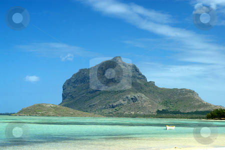 To use this stock image in your creative project, please select the size you need over to the right and click the "Add to Cart" button.
Your downloaded image will come with the Cutcaster watermark removed so don’t worry about the watermark you see on this page. Le Morne Brabant Mountain, Mauritius stock photo, Le Morne Brabant Mountain, a World Heritage site, viewed from La Prairie beach, Mauritius by Steeve Dubois