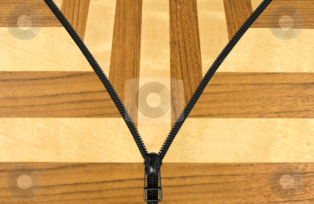 To use this stock image in your creative project, please select the size you need over to the right and click the "Add to Cart" button.
Your downloaded image will come with the Cutcaster watermark removed so don’t worry about the watermark you see on this page. Zipped wood stock photo, Zipper opening to wooden background by John Teeter