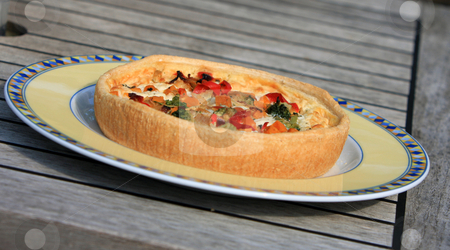 To use this stock image in your creative project, please select the size you need over to the right and click the "Add to Cart" button.
Your downloaded image will come with the Cutcaster watermark removed so don’t worry about the watermark you see on this page. Quiche stock photo, Roasted vegetable quiche on a wooden table by Karen Arnold
