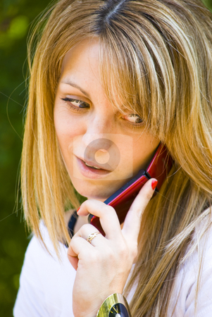 To use this stock image in your creative project, please select the size you need over to the right and click the "Add to Cart" button.
Your downloaded image will come with the Cutcaster watermark removed so don’t worry about the watermark you see on this page. Beautiful young woman talking on phone stock photo, Beautiful young model talking on phone by Desislava Dimitrova