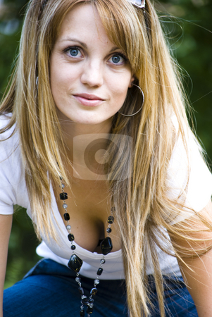 To use this stock image in your creative project, please select the size you need over to the right and click the "Add to Cart" button.
Your downloaded image will come with the Cutcaster watermark removed so don’t worry about the watermark you see on this page. Beautiful young woman portrait stock photo, Beautiful young woman outdoor portrait by Desislava Dimitrova