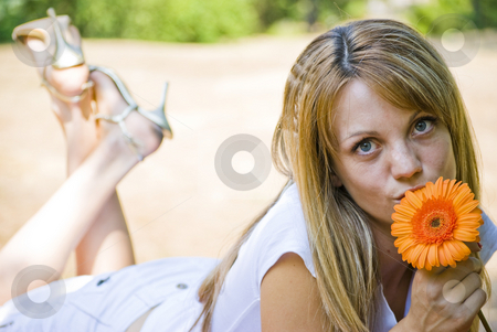 To use this stock image in your creative project, please select the size you need over to the right and click the "Add to Cart" button.
Your downloaded image will come with the Cutcaster watermark removed so don’t worry about the watermark you see on this page. Beautiful young woman with flower stock photo, Beautiful young blonde woman with flower by Desislava Dimitrova