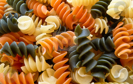 To use this stock image in your creative project, please select the size you need over to the right and click the "Add to Cart" button.
Your downloaded image will come with the Cutcaster watermark removed so don’t worry about the watermark you see on this page. Spiral pasta stock photo, Tri colored spiral pasta by Monica Boorboor