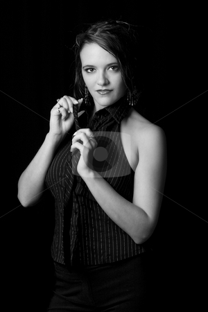 To use this stock image in your creative project, please select the size you need over to the right and click the "Add to Cart" button.
Your downloaded image will come with the Cutcaster watermark removed so don’t worry about the watermark you see on this page. Business women undressing stock photo, Young and sexy business women undoing her tie by Yann Poirier