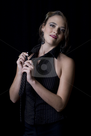 To use this stock image in your creative project, please select the size you need over to the right and click the "Add to Cart" button.
Your downloaded image will come with the Cutcaster watermark removed so don’t worry about the watermark you see on this page. Business women undressing stock photo, Young and sexy business women undoing her tie by Yann Poirier