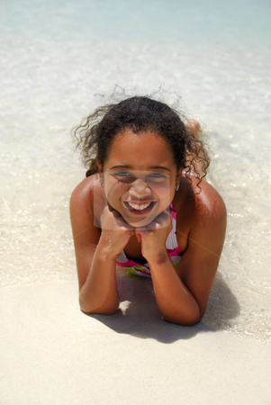 To use this stock image in your creative project, please select the size you need over to the right and click the "Add to Cart" button.
Your downloaded image will come with the Cutcaster watermark removed so don’t worry about the watermark you see on this page. Happy at the beach stock photo, Cute girl with big smile on the beach by Monica Boorboor