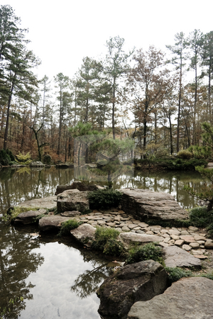 To use this stock image in your creative project, please select the size you need over to the right and click the "Add to Cart" button.
Your downloaded image will come with the Cutcaster watermark removed so don’t worry about the watermark you see on this page. Tranquil Pond stock photo, A tranquil pond and pine tree alone in the woods by Kevin Tietz