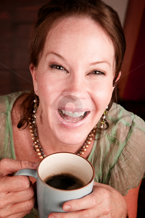 To use this stock image in your creative project, please select the size you need over to the right and click the "Add to Cart" button.
Your downloaded image will come with the Cutcaster watermark removed so don’t worry about the watermark you see on this page. Pretty woman with coffee stock photo, Pretty African American woman with cheerful expression holding coffee by Scott Griessel