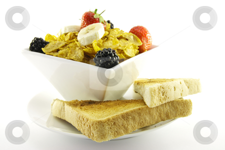 To use this stock image in your creative project, please select the size you need over to the right and click the "Add to Cart" button.
Your downloaded image will come with the Cutcaster watermark removed so don’t worry about the watermark you see on this page. Cornflakes and Fruit with Toast stock photo, Cornflakes with strawberries, blackberries and banana in a square white bowl with toast on a plate with a white background by Keith Wilson