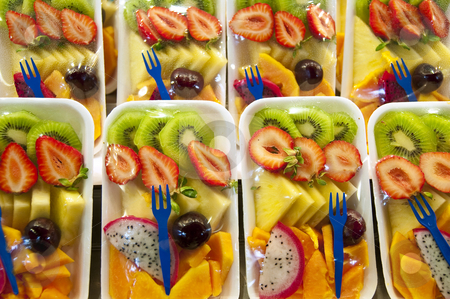 To use this stock image in your creative project, please select the size you need over to the right and click the "Add to Cart" button.
Your downloaded image will come with the Cutcaster watermark removed so don’t worry about the watermark you see on this page. Packed fruit salad. stock photo, We can find these packed fruit salad on many stands inside the Boqueria Market, in Barcelona, Spain. by Anibal Trejo