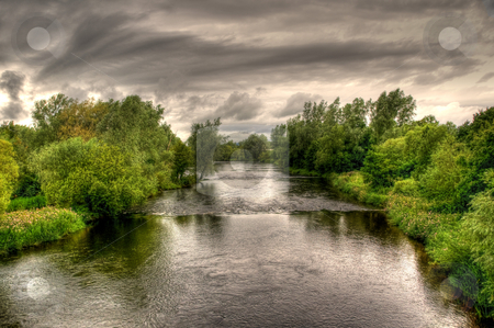 To use this stock image in your creative project, please select the size you need over to the right and click the "Add to Cart" button.
Your downloaded image will come with the Cutcaster watermark removed so don’t worry about the watermark you see on this page. River Shannon on a cloudy day stock photo, An image of the river shannon in Limerick, Ireland on an overcast day by Stephen Kiernan