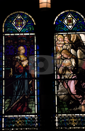 To use this stock image in your creative project, please select the size you need over to the right and click the "Add to Cart" button.
Your downloaded image will come with the Cutcaster watermark removed so don’t worry about the watermark you see on this page. Stained Glass Saint Bartholomew's Episcopal Church New York City stock photo, Stained Glass of Angels and Holy Woman, Saint Bartholomew's Episcopal Church Park Avenue New York City Glass by Hildreth Meiere and finished in 1920. by William Perry