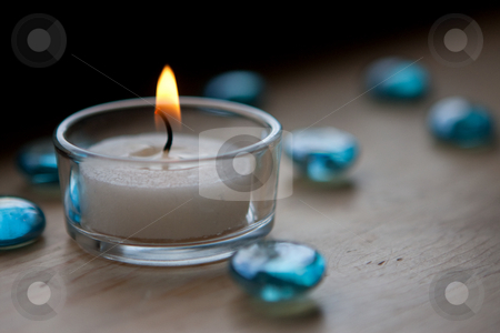 To use this stock image in your creative project, please select the size you need over to the right and click the "Add to Cart" button.
Your downloaded image will come with the Cutcaster watermark removed so don’t worry about the watermark you see on this page. White tealight candle stock photo, A white tealight candle lit for decoration by Sharon Arnoldi
