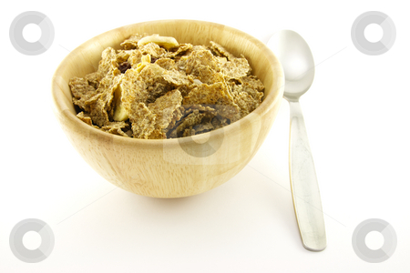 To use this stock image in your creative project, please select the size you need over to the right and click the "Add to Cart" button.
Your downloaded image will come with the Cutcaster watermark removed so don’t worry about the watermark you see on this page. Bran Flakes in a Woodden Bowl stock photo, Crunchy delicious looking bran flakes in a wooden bowl with a spoon on a white background by Keith Wilson