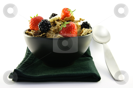 To use this stock image in your creative project, please select the size you need over to the right and click the "Add to Cart" button.
Your downloaded image will come with the Cutcaster watermark removed so don’t worry about the watermark you see on this page. Bran Flakes in a Black Bowl stock photo, Crunchy looking delicious bran flakes and juicy fruit in a black bowl with a spoon on a black napkin on a white background by Keith Wilson