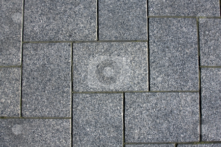 To use this stock image in your creative project, please select the size you need over to the right and click the "Add to Cart" button.
Your downloaded image will come with the Cutcaster watermark removed so don’t worry about the watermark you see on this page. Granite pavement stock photo, Blue granite brick pavement in a herringbone pattern by Darren Pattterson