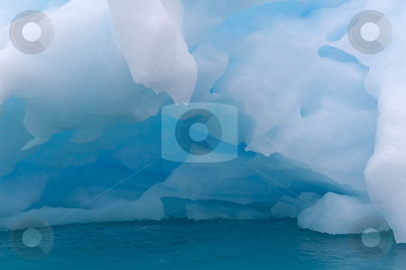 To use this stock image in your creative project, please select the size you need over to the right and click the "Add to Cart" button.
Your downloaded image will come with the Cutcaster watermark removed so don’t worry about the watermark you see on this page. Blue ice stock photo, Blue iceberg in the cold fjord of Narsarsuaq, Greenland by Anders Peter