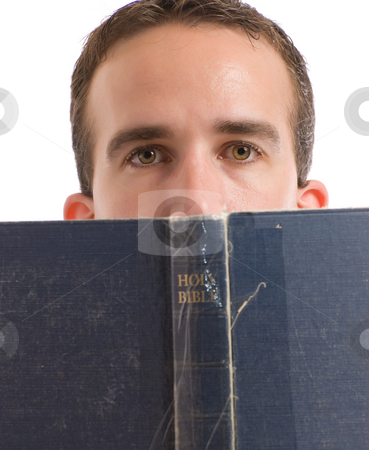 To use this stock image in your creative project, please select the size you need over to the right and click the "Add to Cart" button.
Your downloaded image will come with the Cutcaster watermark removed so don’t worry about the watermark you see on this page. Man Reading Bible stock photo, A young man reading his bible with hald his head behind it, isolated against a white background by Richard Nelson