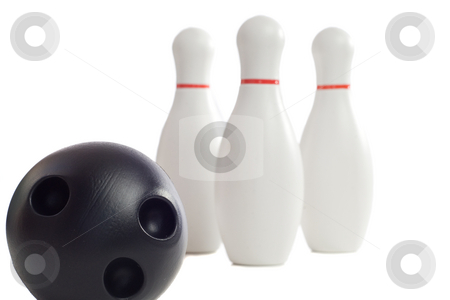 To use this stock image in your creative project, please select the size you need over to the right and click the "Add to Cart" button.
Your downloaded image will come with the Cutcaster watermark removed so don’t worry about the watermark you see on this page. Child's Bowling Toys stock photo, A plastic bowling ball rolling towards three pins, isolated against a white background by Richard Nelson