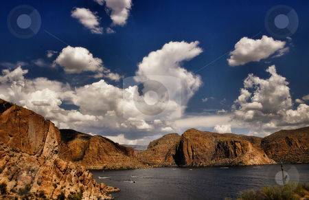 To use this stock image in your creative project, please select the size you need over to the right and click the "Add to Cart" button.
Your downloaded image will come with the Cutcaster watermark removed so don’t worry about the watermark you see on this page. Apache lake arizona stock photo, Scenic view of apache lake in arizona by Monica Boorboor
