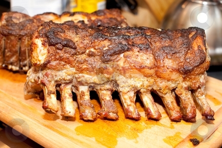 To use this stock image in your creative project, please select the size you need over to the right and click the "Add to Cart" button.
Your downloaded image will come with the Cutcaster watermark removed so don’t worry about the watermark you see on this page. Pork ribs stock photo, Home made oven roasted pork ribs are finger-lickin' good anytime. by Mariusz Jurgielewicz