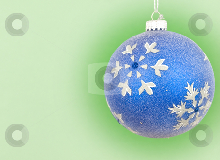 To use this stock image in your creative project, please select the size you need over to the right and click the "Add to Cart" button.
Your downloaded image will come with the Cutcaster watermark removed so don’t worry about the watermark you see on this page. Chirstmas ornament hanging stock photo, Blue bauble ornament hanging with green background by John Teeter
