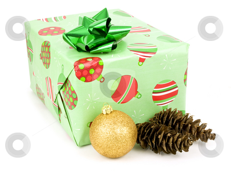 To use this stock image in your creative project, please select the size you need over to the right and click the "Add to Cart" button.
Your downloaded image will come with the Cutcaster watermark removed so don’t worry about the watermark you see on this page. Present with bauble and pine cone stock photo, Present with baubel and pine cone on white background by John Teeter
