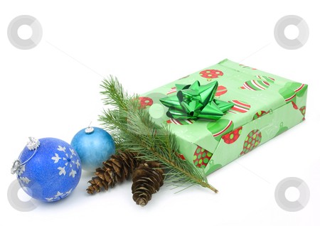 To use this stock image in your creative project, please select the size you need over to the right and click the "Add to Cart" button.
Your downloaded image will come with the Cutcaster watermark removed so don’t worry about the watermark you see on this page. Christmas on white stock photo, Christmas ornaments and present on white background by John Teeter