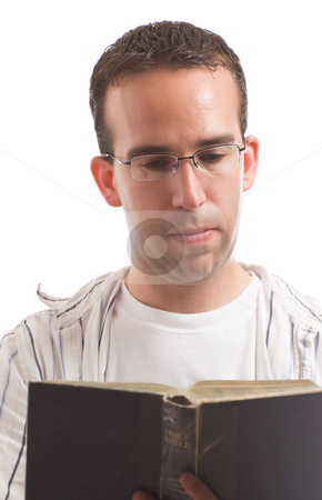 To use this stock image in your creative project, please select the size you need over to the right and click the "Add to Cart" button.
Your downloaded image will come with the Cutcaster watermark removed so don’t worry about the watermark you see on this page. Man Reading A Bible stock photo, A young man wearing glasses is reading an old bible, isolated against a white background by Richard Nelson