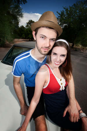 To use this stock image in your creative project, please select the size you need over to the right and click the "Add to Cart" button.
Your downloaded image will come with the Cutcaster watermark removed so don’t worry about the watermark you see on this page. Hipster Couple stock photo, Hipster Couple Sitting on an Old Car by Scott Griessel