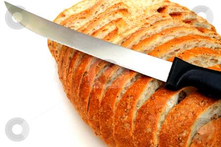 To use this stock image in your creative project, please select the size you need over to the right and click the "Add to Cart" button.
Your downloaded image will come with the Cutcaster watermark removed so don’t worry about the watermark you see on this page. Cracked Wheat Sourdough Bread stock photo, Sliced fresh sourdough bread with a serrated knife on a white background. by Lynn Bendickson