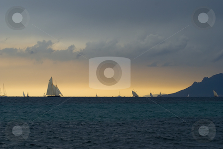 To use this stock image in your creative project, please select the size you need over to the right and click the "Add to Cart" button.
Your downloaded image will come with the Cutcaster watermark removed so don’t worry about the watermark you see on this page. Regattas under storm stock photo, Old sailboats in Cannes bay during