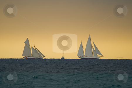 To use this stock image in your creative project, please select the size you need over to the right and click the "Add to Cart" button.
Your downloaded image will come with the Cutcaster watermark removed so don’t worry about the watermark you see on this page. Regattas under storm stock photo, Old sailboats in Cannes bay during