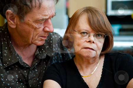 To use this stock image in your creative project, please select the size you need over to the right and click the "Add to Cart" button.
Your downloaded image will come with the Cutcaster watermark removed so don’t worry about the watermark you see on this page. Senior Couple at Home stock photo, Worried Senior Couple at Home in Modern Kitchen by Scott Griessel