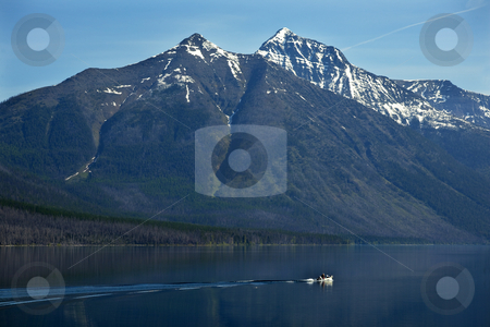 To use this stock image in your creative project, please select the size you need over to the right and click the "Add to Cart" button.
Your downloaded image will come with the Cutcaster watermark removed so don’t worry about the watermark you see on this page. Lake McDonald Fishing Boat Glacier National Park Montana stock photo, Lake McDonald Going Fishing Outboard in front of Snow Mountain Glacier National Park Montana by William Perry