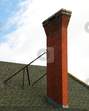To use this stock image in your creative project, please select the size you need over to the right and click the "Add to Cart" button.
Your downloaded image will come with the Cutcaster watermark removed so don’t worry about the watermark you see on this page. Chimney stock photo, Old red brick chimney with clouds in the background by Henrik Lehnerer