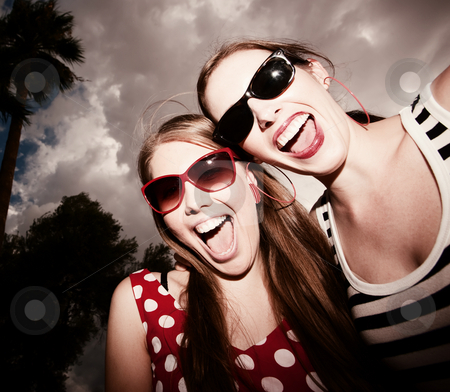To use this stock image in your creative project, please select the size you need over to the right and click the "Add to Cart" button.
Your downloaded image will come with the Cutcaster watermark removed so don’t worry about the watermark you see on this page. Fashion Girls Against a Cloudy Sky stock photo, Fashion Girls on a Stormy Day Against Cloudy Sky by Scott Griessel