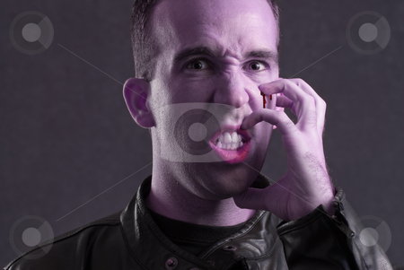 To use this stock image in your creative project, please select the size you need over to the right and click the "Add to Cart" button.
Your downloaded image will come with the Cutcaster watermark removed so don’t worry about the watermark you see on this page. Frustration stock photo, A scary halloween image of a blue man digging his fingers into his face and making himself bleed, because he is frustrated by Richard Nelson