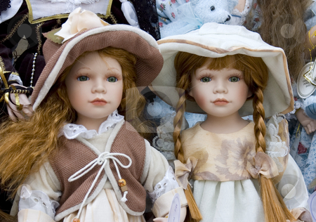 To use this stock image in your creative project, please select the size you need over to the right and click the "Add to Cart" button.
Your downloaded image will come with the Cutcaster watermark removed so don’t worry about the watermark you see on this page. Delicate Dolls stock photo, Two pretty dolls on display by Lee Torrens