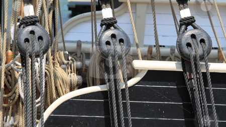 To use this stock image in your creative project, please select the size you need over to the right and click the "Add to Cart" button.
Your downloaded image will come with the Cutcaster watermark removed so don’t worry about the watermark you see on this page. Rigging stock photo, Close up of block and rigging on a sail boat by Henrik Lehnerer