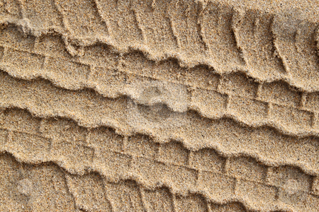 To use this stock image in your creative project, please select the size you need over to the right and click the "Add to Cart" button.
Your downloaded image will come with the Cutcaster watermark removed so don’t worry about the watermark you see on this page. Close up of a tire track in the sand. stock photo, Close up of a tire track in the sand. by Stephen Rees