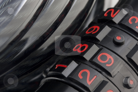 To use this stock image in your creative project, please select the size you need over to the right and click the "Add to Cart" button.
Your downloaded image will come with the Cutcaster watermark removed so don’t worry about the watermark you see on this page. Bicycle combination lock and cable abstract stock photo, Black metal combination bicycle lock with red numbers and colis of heavy duty wire cable in plastic sheat - abstract by Marek Uliasz